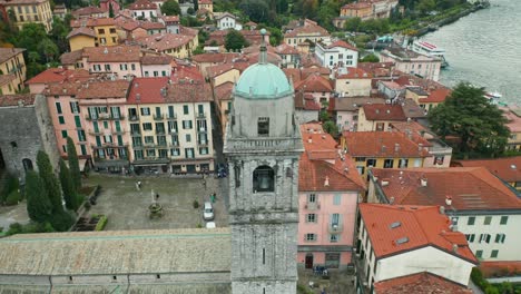 AERIAL:-Bellagio-is-a-village-on-a-promontory-jutting-out-into-Lake-Como,-in-Italy