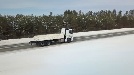 white truck on snowy road