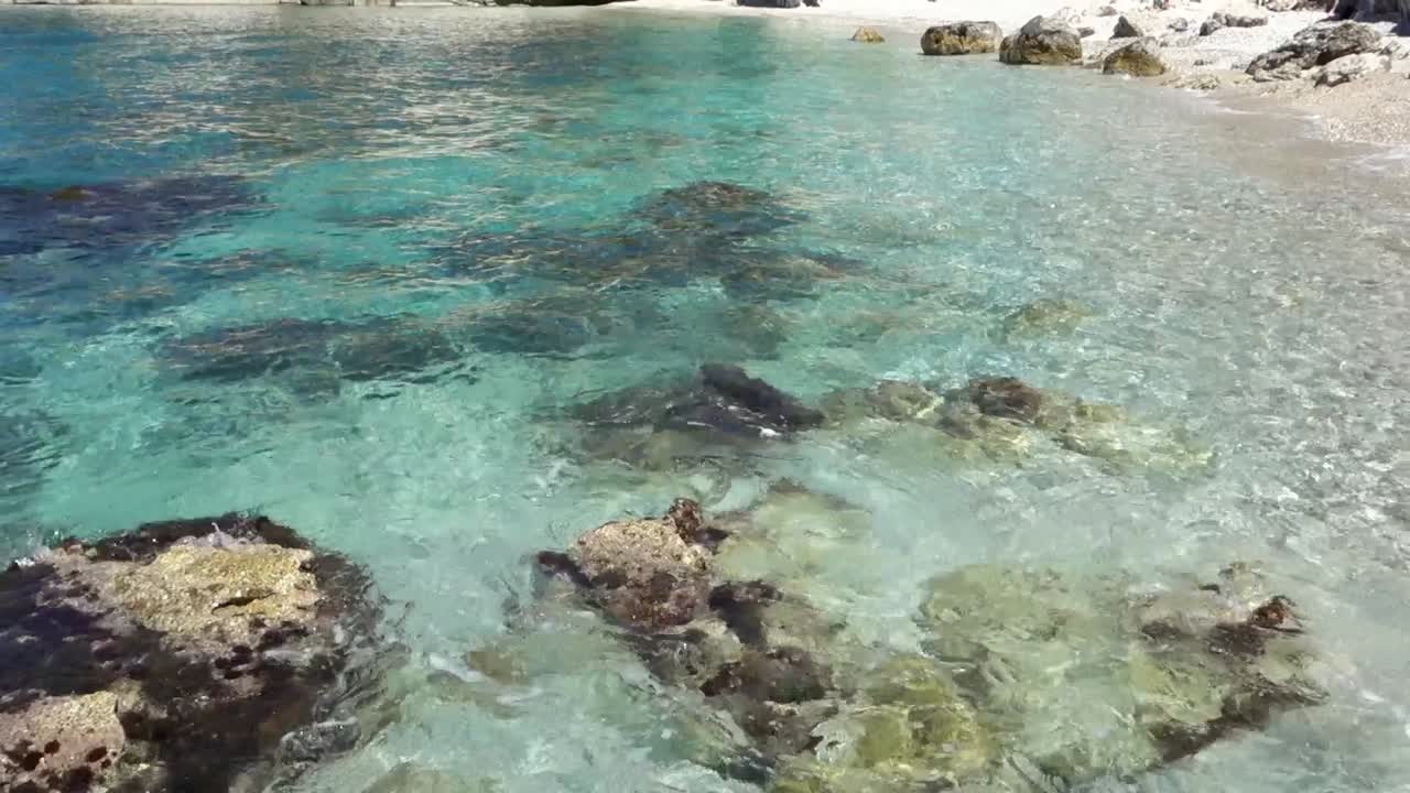 crystal clear sea and cliffs at Filikuri beach. Albanian riviera, Ionian Sea