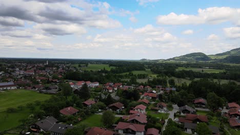 the drone flies over the bavarian village in the alps. german mountain landscape in upper bavariadrone