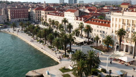 split riva waterfront walkway in croatia - aerial drone shot