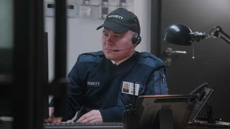 security guard working in a control room