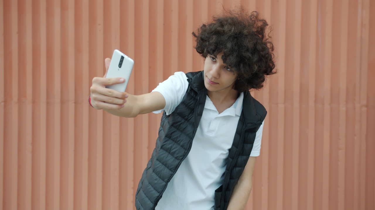 Teenager taking a selfie