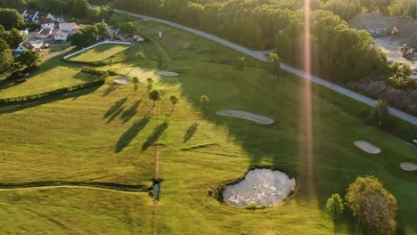 panoramic shot with sun flare of golf course at molndal near gothenburg in sweden