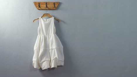 Dress-hanging-on-hook-4k