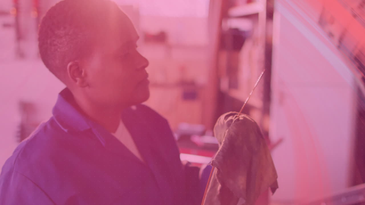 Woman artist examining clay sculpture on wire armature in art studio, integrating digital HUD