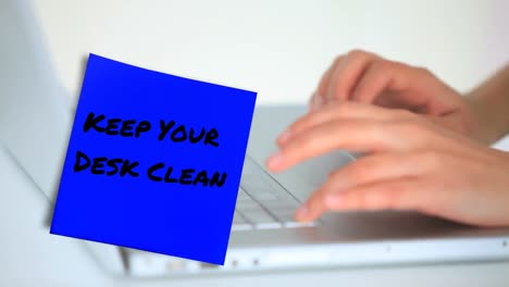 animation of keep your desk clean text over hands of caucasian businesswoman typing on keyboard
