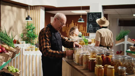 old employee restocks local store