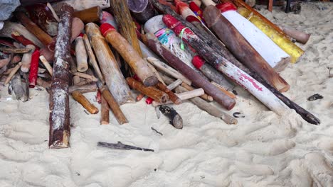 colorful wooden offerings in a sacred cave