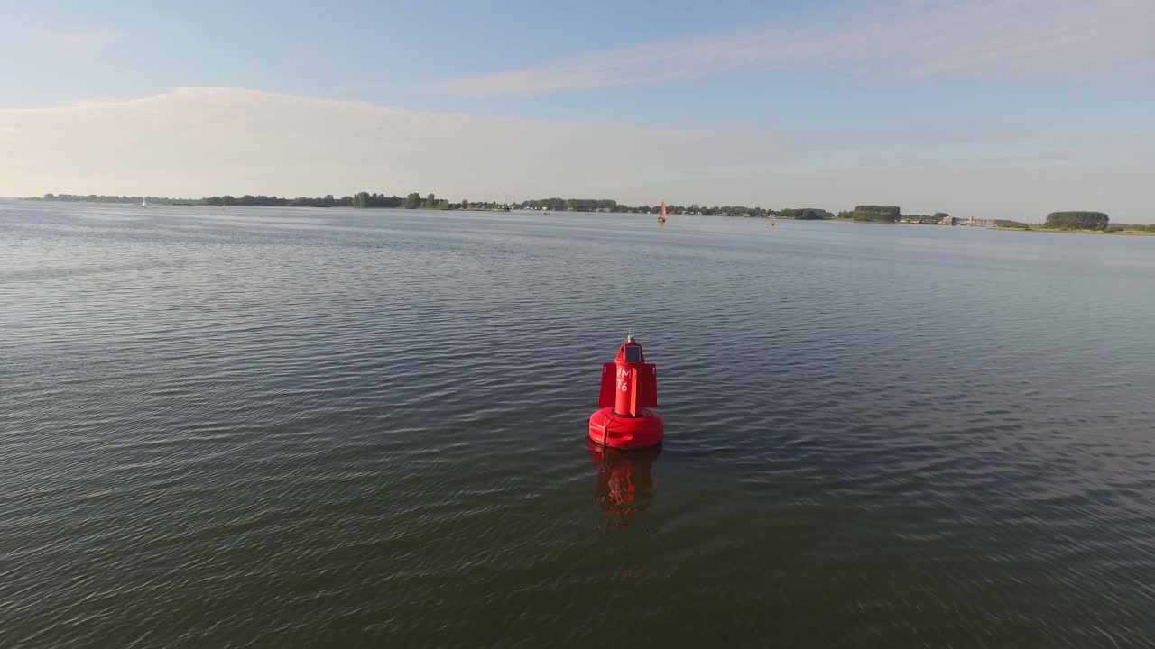 A red buoy in the water