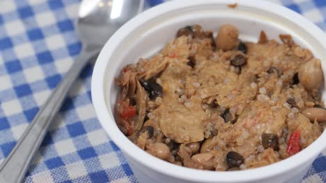 tuna with a mixed vegetables in bowl on white,