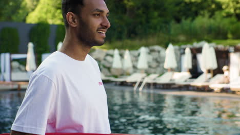 Lifeguard-looking-around-the-swimming-pool