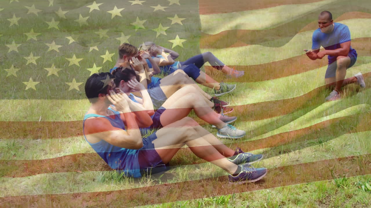 잔디 위 에 앉아서 운동 하는 운동 선수 들