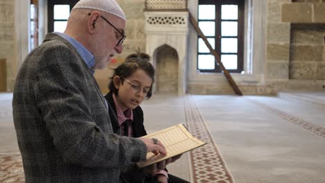 parent teaching quran