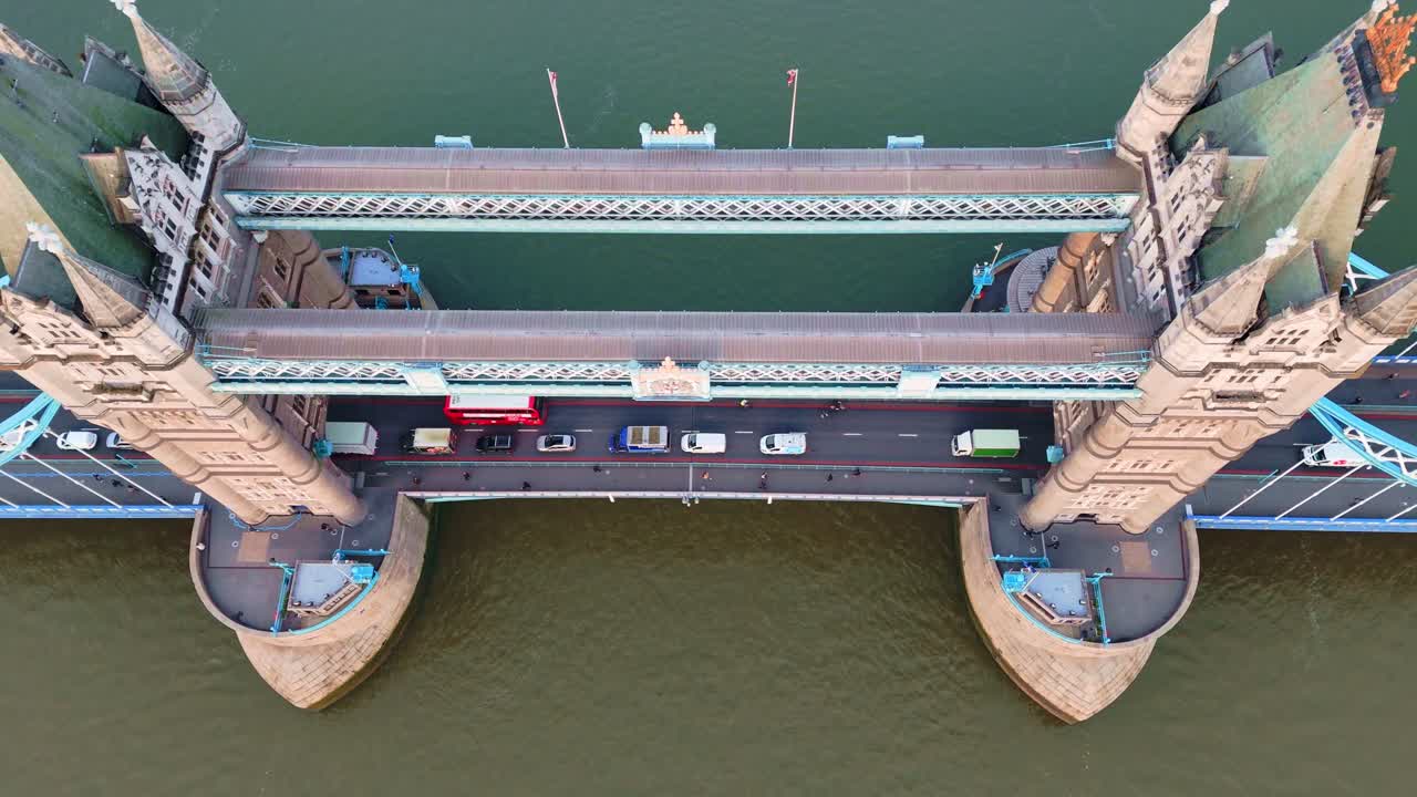 Birdseye view of transport and people crossing Tower Bridge in London