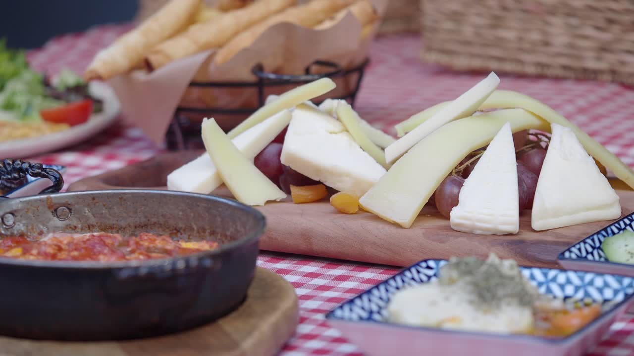 Turkish Breakfast Spread with Cheese, Fruit, and Eggs