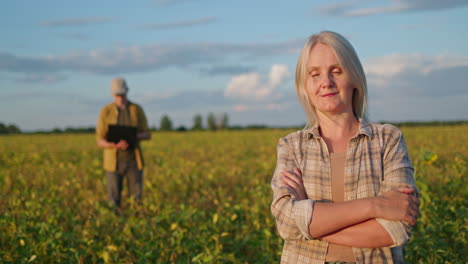 woman farmer in a soybean field