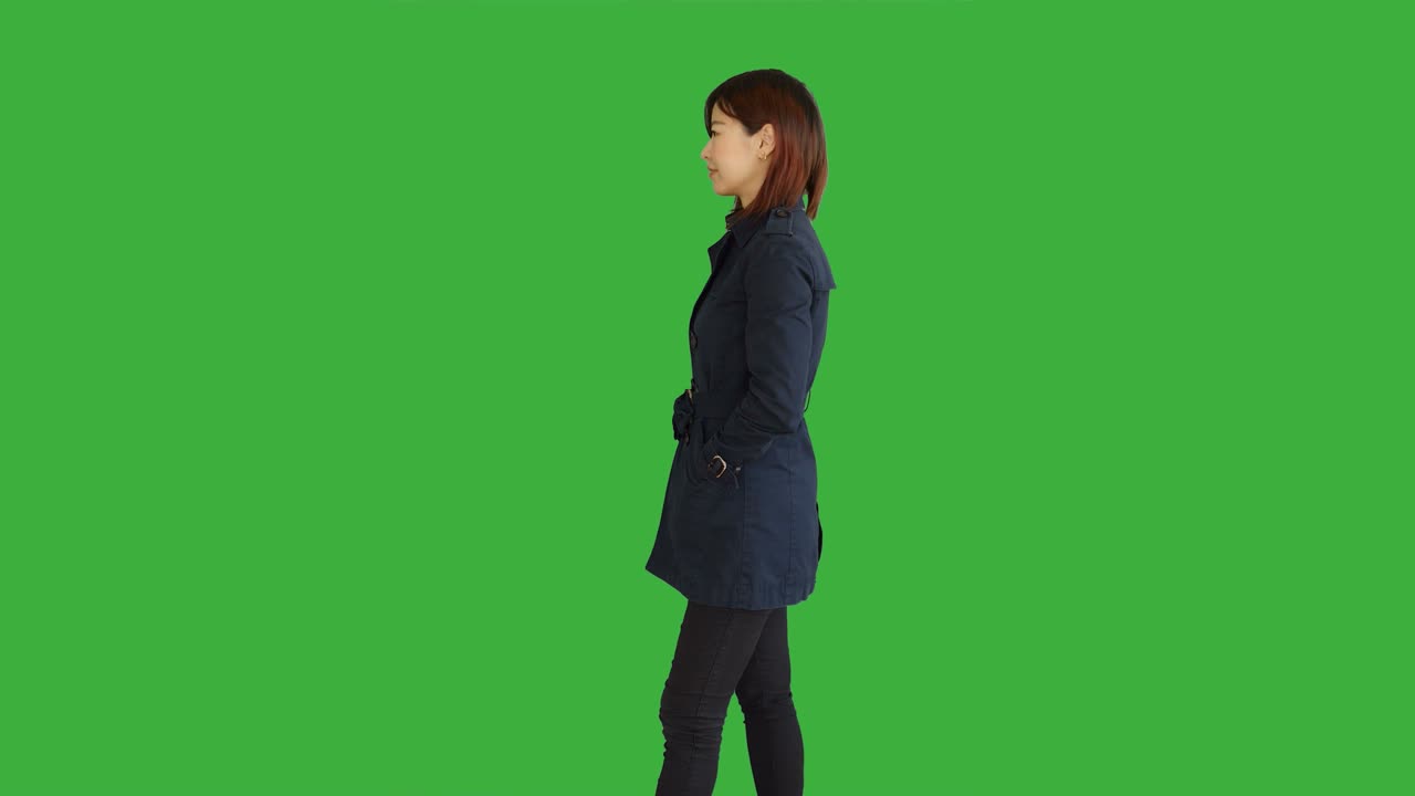 Young Asian Women Standing Isolated Against Green Screen Background. Portrait of Chinese Female Person.
