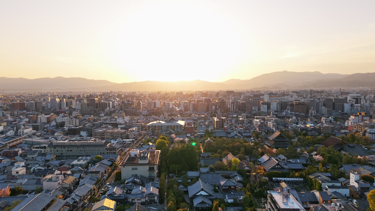 Aerial drone view of Kyoto, Japan at sunset