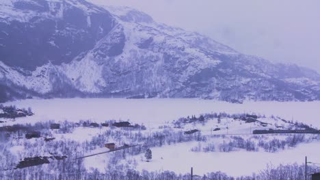 A-train-travels-through-a-snowy-landscape-in-Europe-2