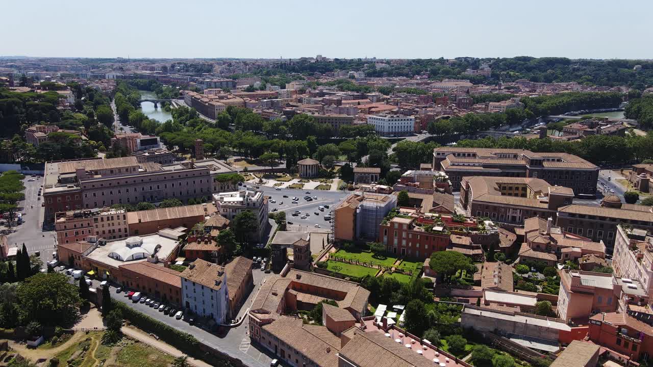 Sweeping drone shot of Rome reveals urban sprawl, domes and winding Tiber river
