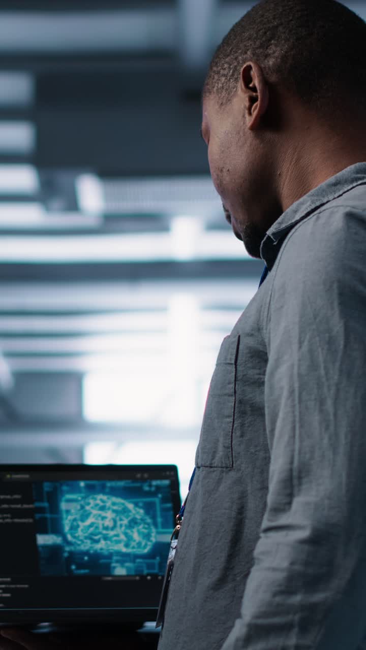 Vertical video Software developers in data center using laptop, employing AI machine learning