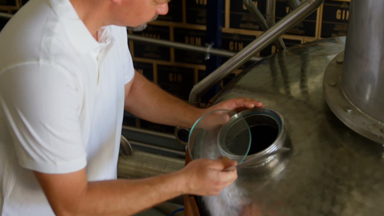 Male worker working in factory 4k