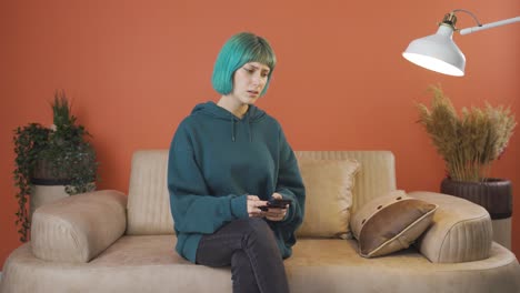 young woman getting breakup texting gets upset.