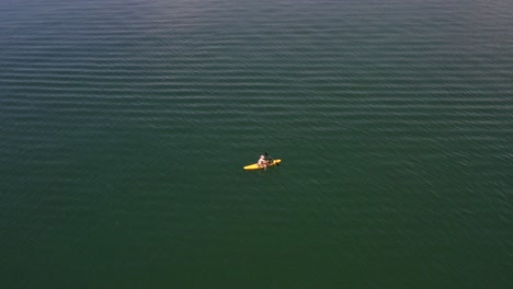 Paddle-board-on-water-from-above-on-Coche-Island,-Margarita-in-Venezuela