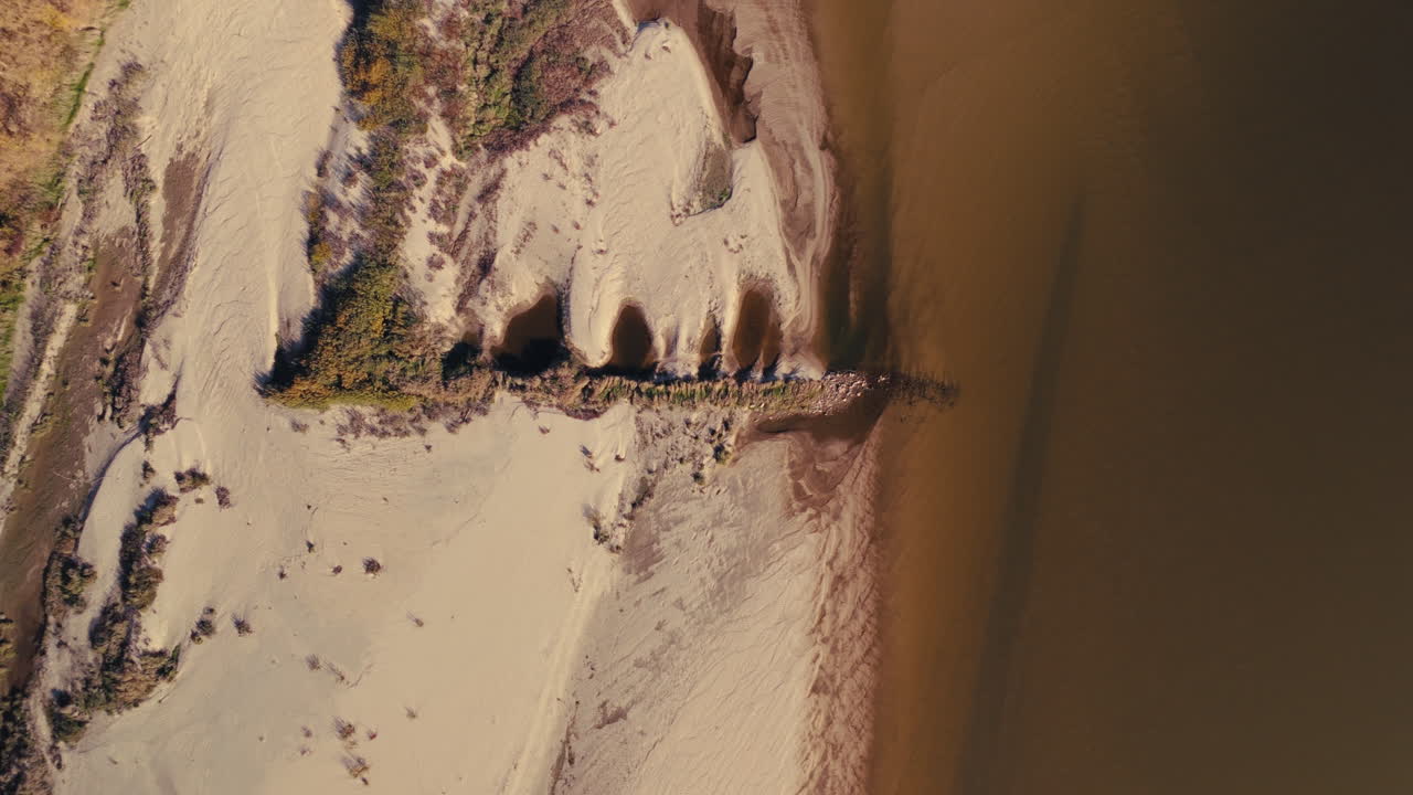 Aerial View of River Delta and Sand Dunes