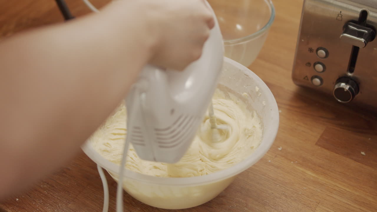 Electric Handheld Mixer Stirring Cake Ingredients Slow Motion