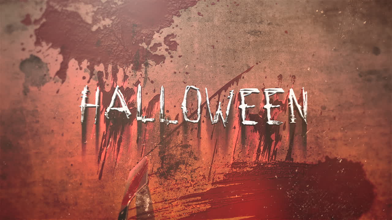 halloween con sangre roja en la pared con un cuchillo