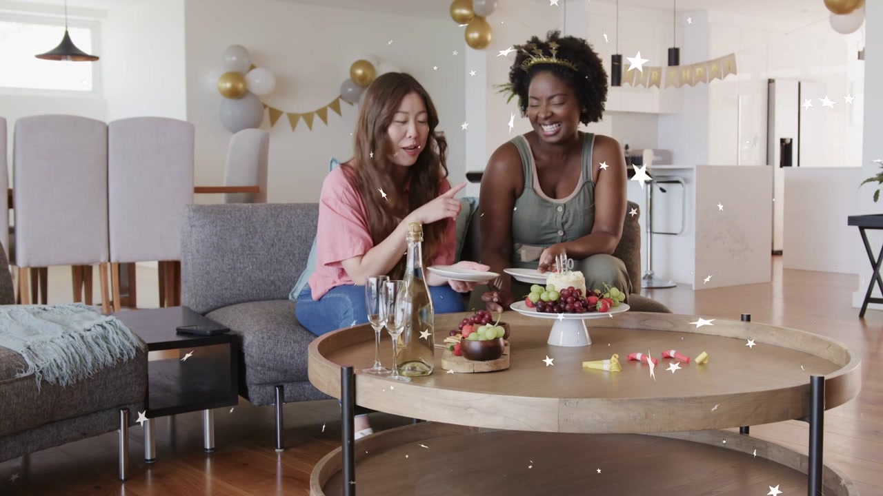 Honoree reaching for cake, friend handing plates serving slices for party, sparkles around hands