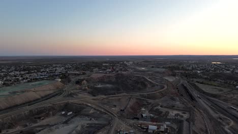 a cinematic drone flight over the historic line of lode in the remote mining town of broken hill new south wales australia
