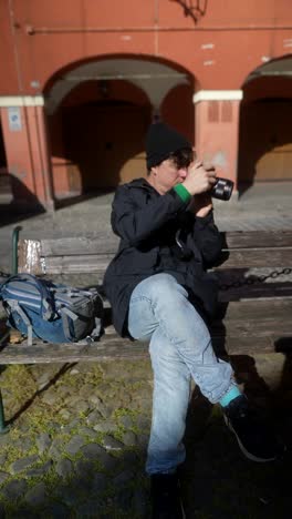 photographer taking pictures in a city park