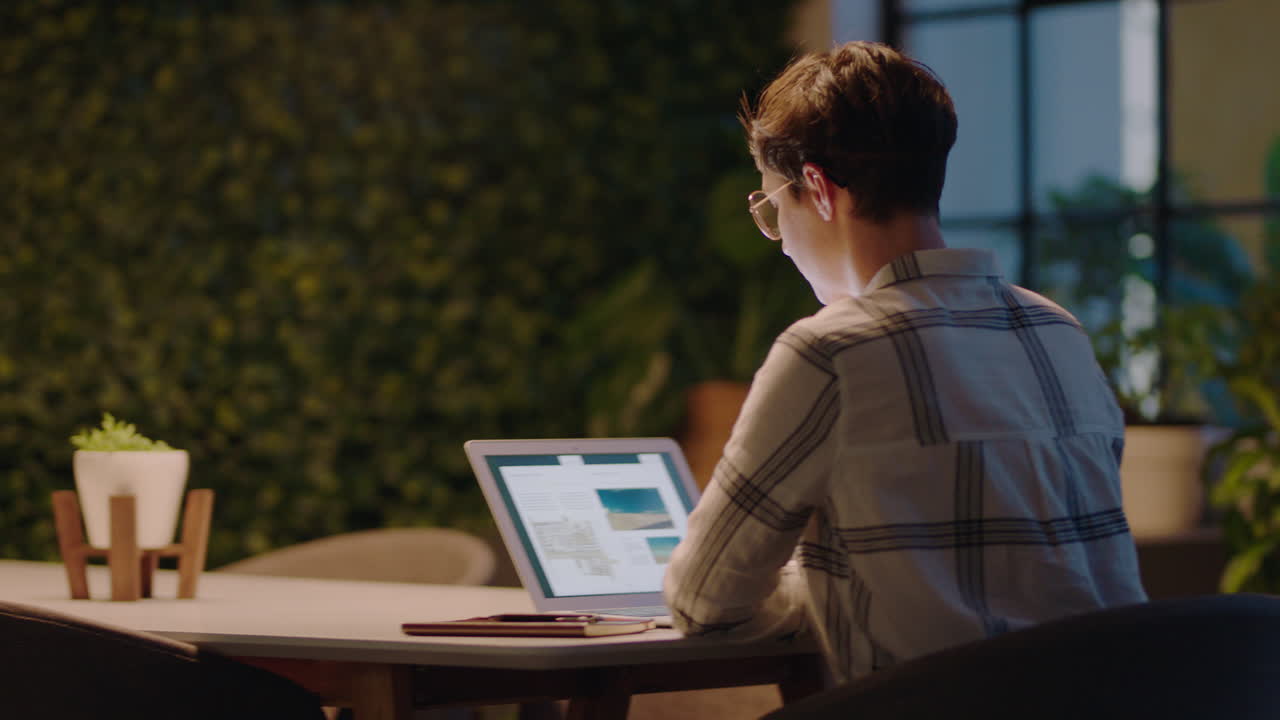 caucasian business woman working late using laptop computer brainstorming planning successful project deadline dedicated entrepreneur in office workplace at night