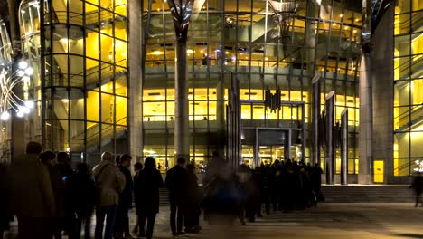 the queue of people at the entrance to a music concert in modern concert hall, time lapse