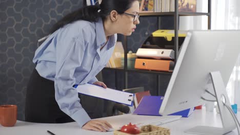 business woman working at computer works at work.