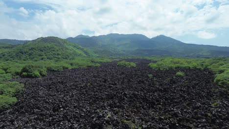 stories of the ceboruco volcano cover the black magma road with frozen rocks