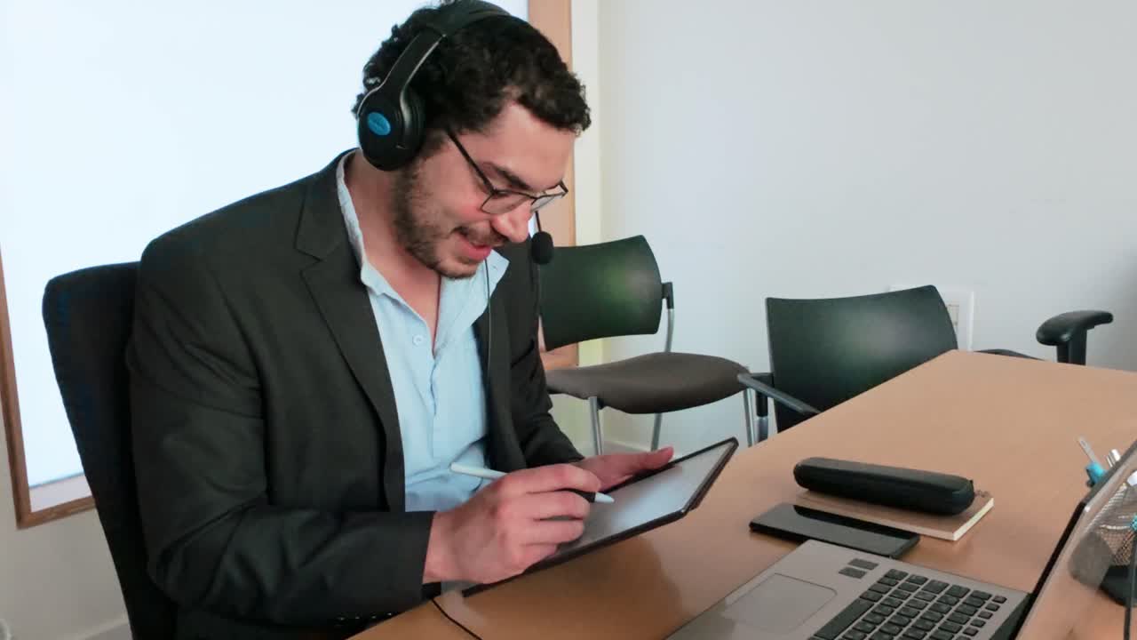 Virtual Team Collaboration: Man with Tablet