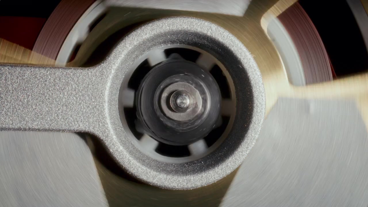 Detailed View of Analog Audio Cassette Tape Spool Rotating