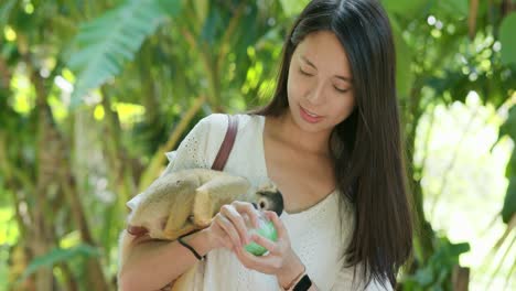 woman and squirrel monkeys