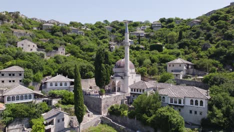 aerial parallax shot around sisman ibrahim pasha mosque in historic village settlement of pocitelj