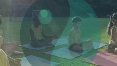 animation of ying yang icons over diverse children meditating