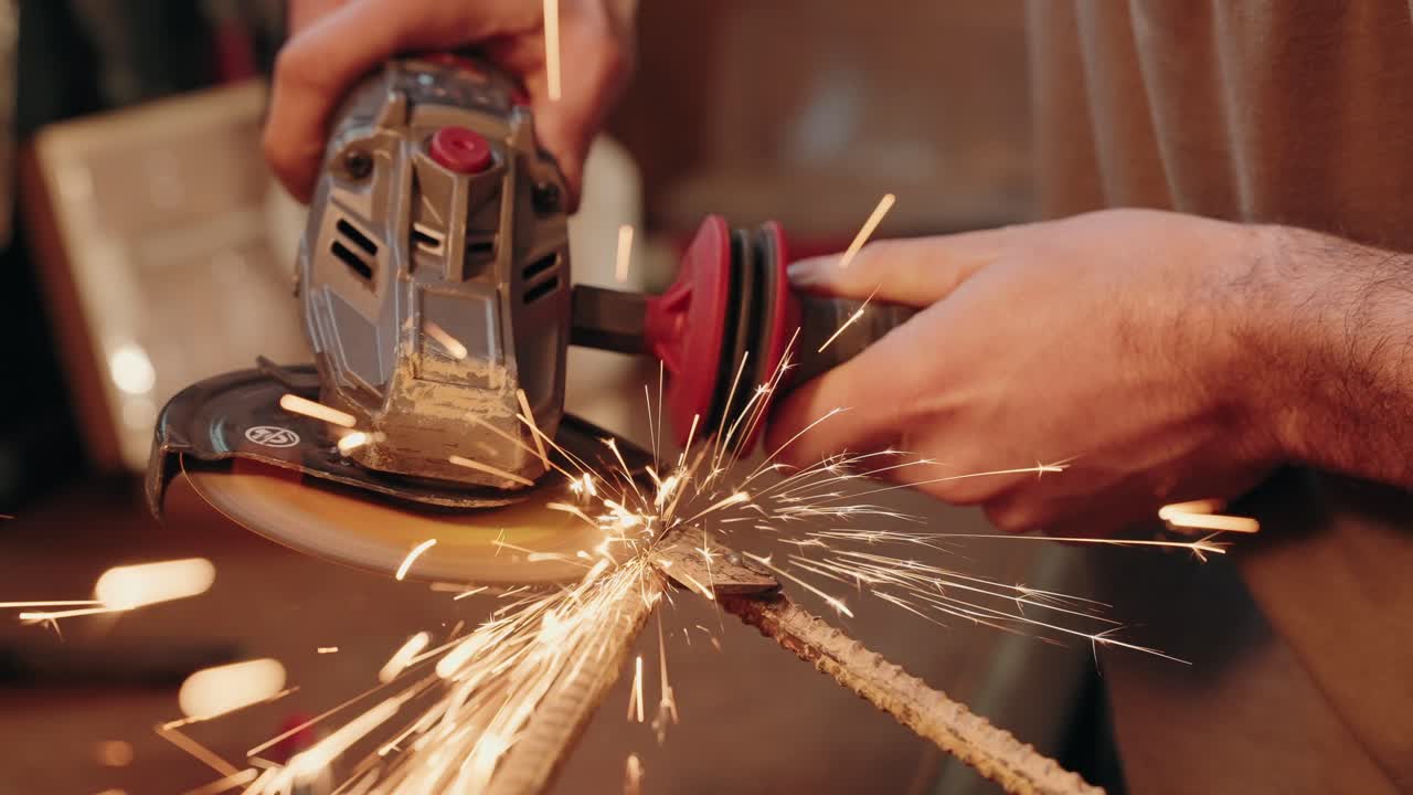 close up of grinder cutting steel rod with bright flying sparks