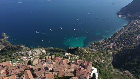 Cinematic-aerial-view-of-Eze-hilltop-village-France-Mediterranean-sea