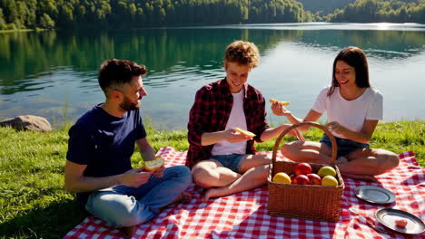 friends enjoying a picnic by the lake
