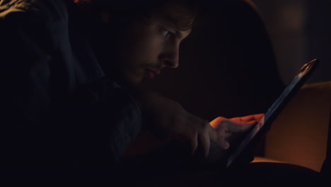 businessman using tablet computer online shopping at home