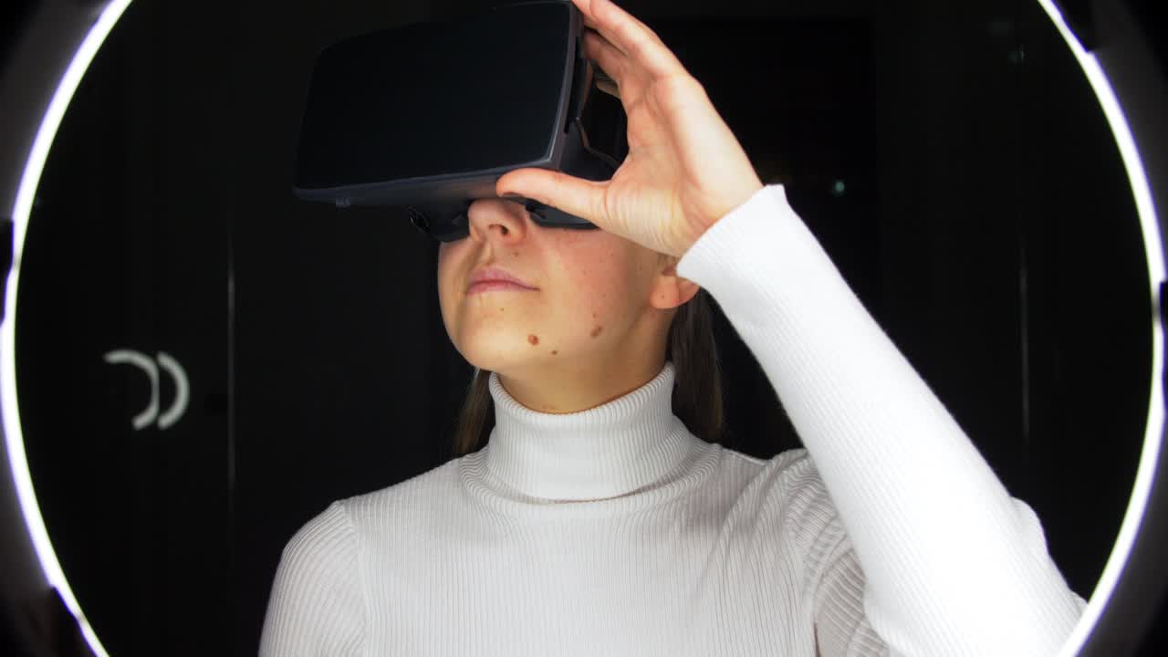woman in virtual reality headset or vr glasses