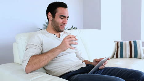 Man-using-a-tablet-